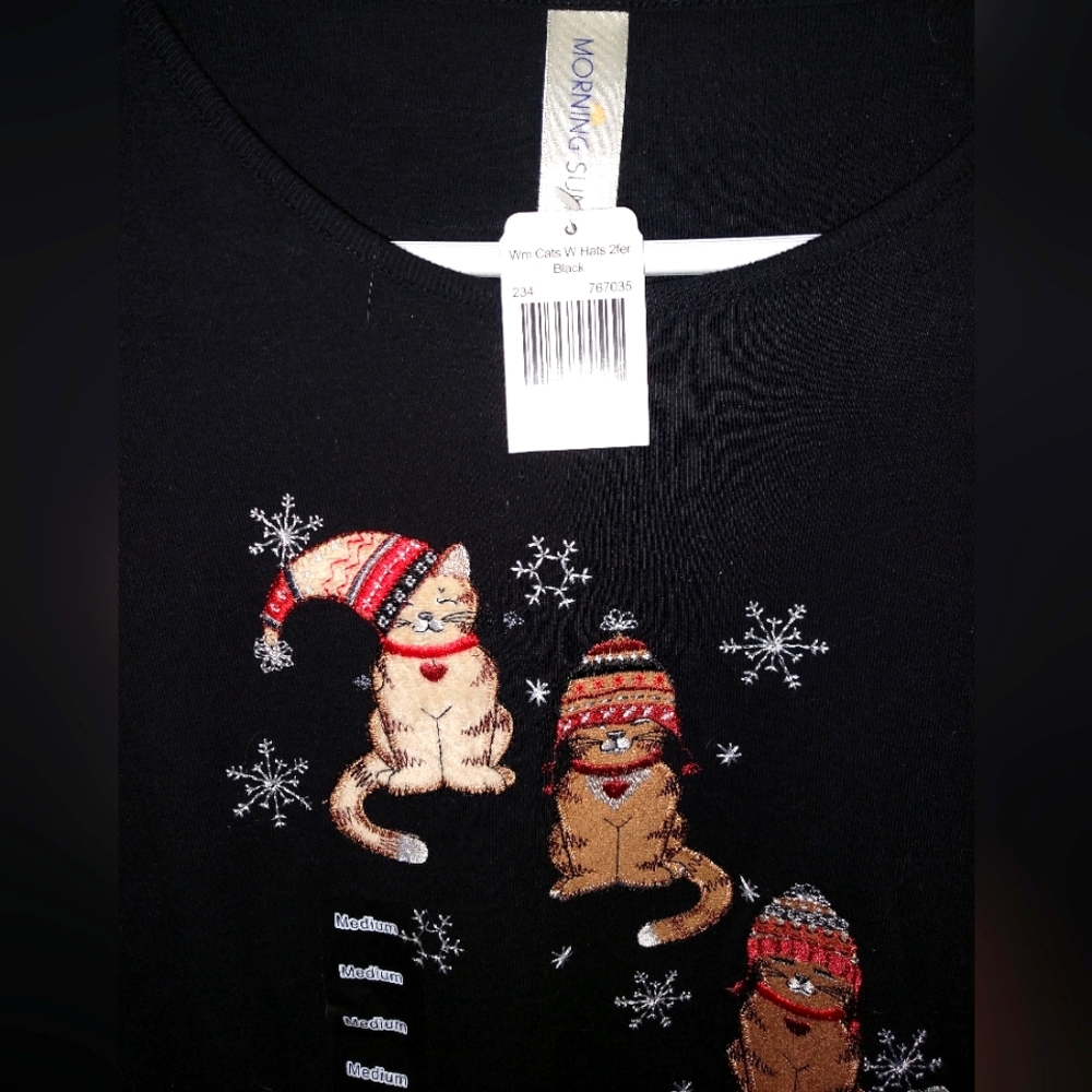 Black winter kitty shirt. Never been worn with tags.